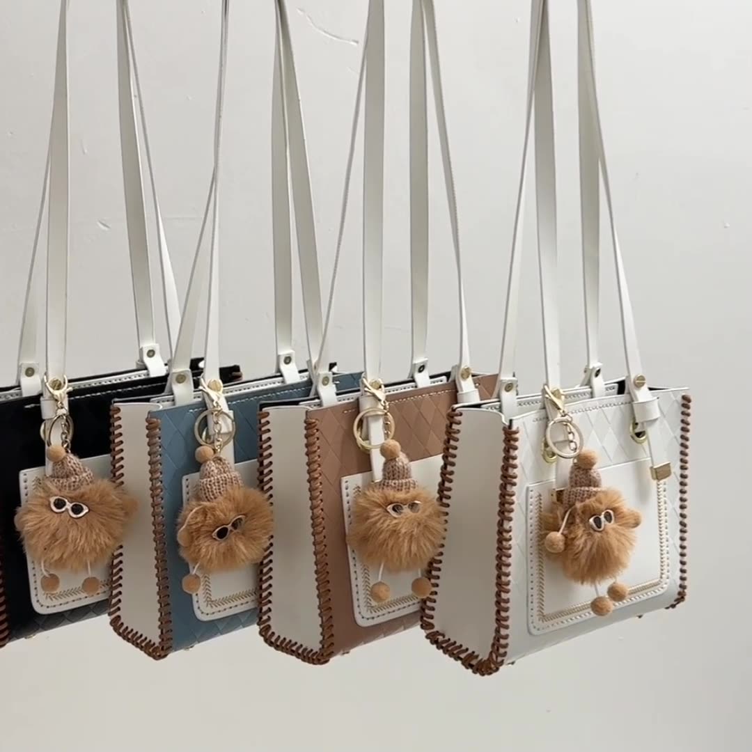 Experience fashion and style with our handmade geometric color-blocked mini bag