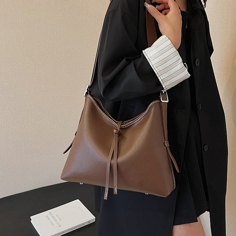 Handsewn shoulder bag with DIY material, perfect as a thoughtful gift