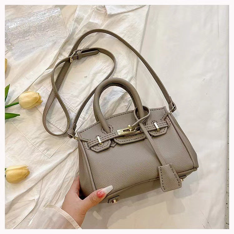 Hand-woven bag high-quality textured lychee pattern handbag