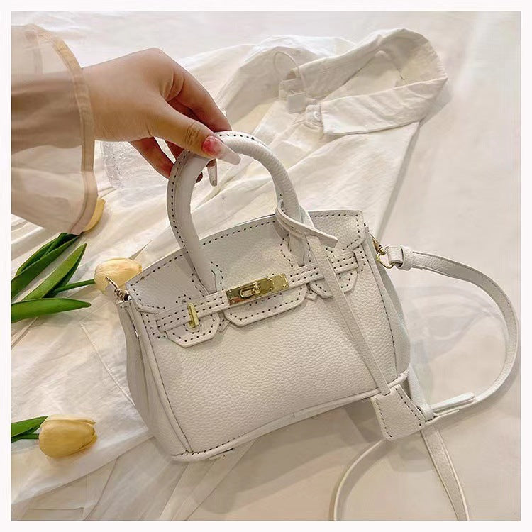 Hand-woven bag high-quality textured lychee pattern handbag