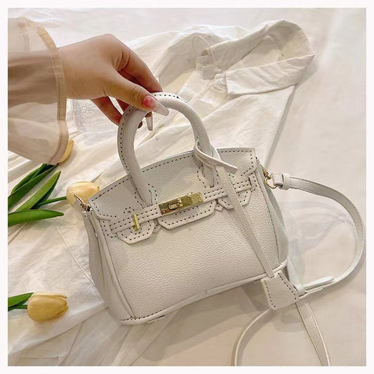 Hand-woven bag high-quality textured lychee pattern handbag