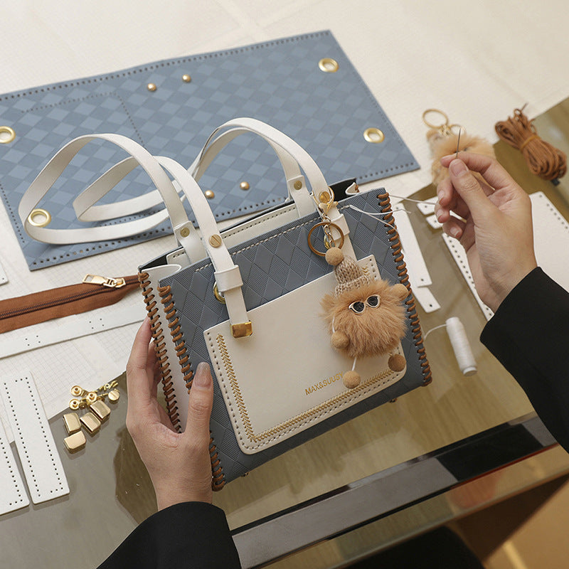 Experience fashion and style with our handmade geometric color-blocked mini bag